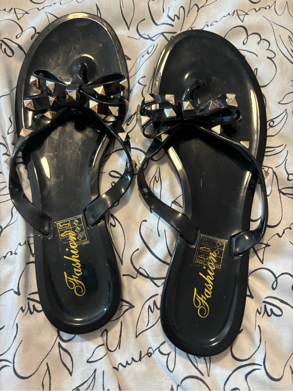 Fashion Nova Black Studded Bow Jelly Sandals